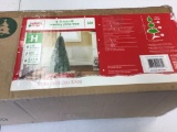 6 foot non lite Wesley Pine Tree in sealed box.