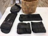 Lot of two sets of adjustable exercise leg weights, wood log container to hold them, set of knee pad