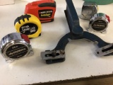 Lot of five tap measures ranging from 16 to 30 feet, one is Black and Decker AutoTape.