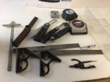 Lot of Measuring tools, includes four angle (one is vintage), two tape measures, two protractors ,