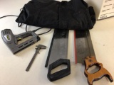 Miscellaneous lot consisting of Two handsaws, Stanley Electric Staple Gun, Vintage Calipers