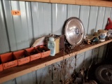 contents of lower shelf, hubcap