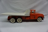 Structo Metal Ford Flatbed Truck with Tilting Bed.