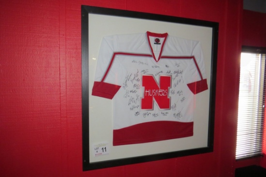 Framed Nebraska Hockey Shirt Signed by the Husker Team.