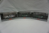 (3) Quartzo 1:43 Scale Models in Boxes, (2) Lotus 11, (1) BMW M1 (All 1 $).