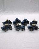 (7) 1/64 Scale Die Cast Metal Ford Tractors.