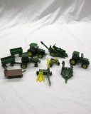 (10) 1/64 Scale John Deere Tractors & Implements.