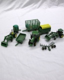 (8) 1/64 Scale John Deere Tractors & Implements.