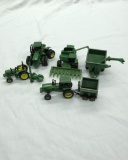 (7) 1/64 Scale John Deere Tractors & Implements.