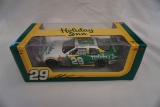 Motorsports Authentic Die Cast Metal 1/24 Scale Holiday Inn Car (NIB).