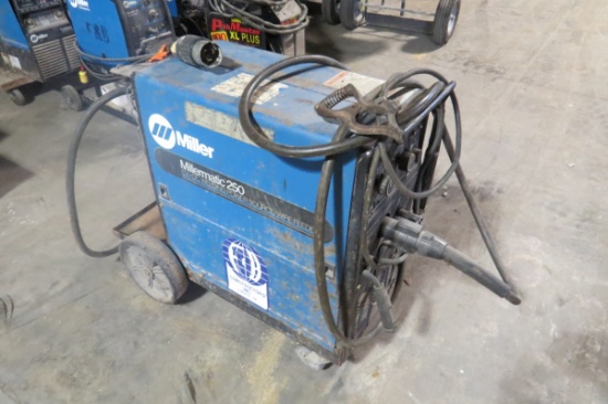 Miller Millermatic 250 Portable Wire Feed Welder on 4-Wheel Cart, Gauges (No Tank), with Leads