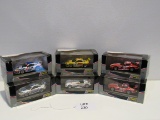 (6) Onyx 1:43 Scale Models in Boxes; (3) Porsche 911 GT3R, (2) Chrysler Vip