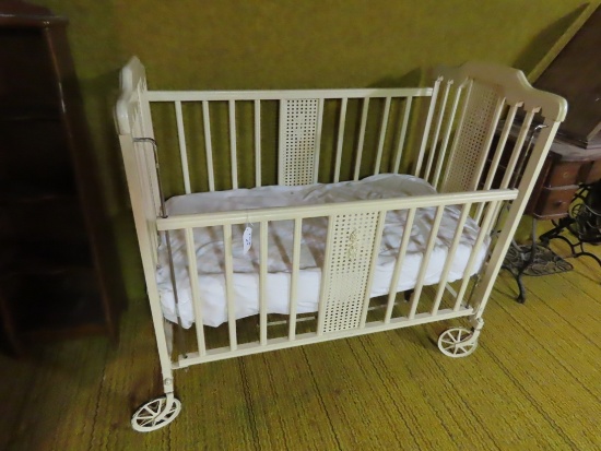 Antique Baby Bed on Wheels.