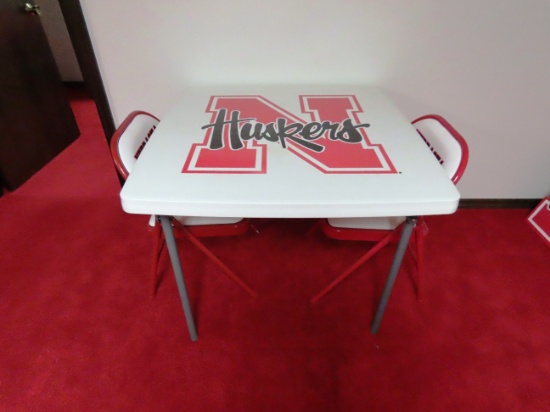Huskers Resin Topped Folding Table with (2) Folding Chairs.