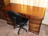 Small Oak Double Pedestal Desk with Center Drawer, Spoon Carved Highlights on Drawers.