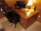 Solid Oak Double Pedestal Desk with Adjustable Office Chair on Wheels.