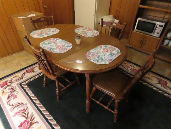 Solid Wood Dining Room Table with (4) Chairs.
