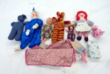 Toys & Dolls with Accessories & a Wicker Carriage.