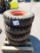 (4) 7:00-15 Skid Loader Tires with Rims.