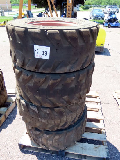 (4) 12-16.5 Skid Loader Tires with Rims.