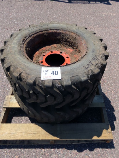 (2) 10-16.5 Skid Loader Tires with Rims.