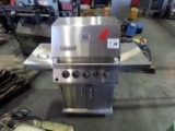 Ducane Stainless Steel Gas Grill with Propane Tank.