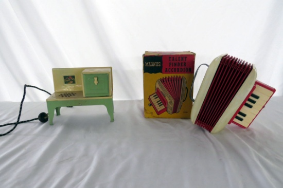 (1) Magnus Plastic Talent Finder Accordion & (1) Metal Toy Stove