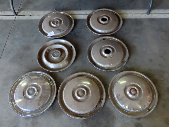 (7) Ford Hub Caps.