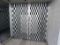 Contents of Bay: Dynaflair Aluminum Security Gate (8'w x 8't), Wall Slat Sh