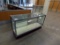 Glass Display Cabinet with Rear Sliding Doors & Small Counter Top Display.