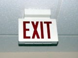 (2) Metal Exit Doors, (3) Exit Lighted Signs & Fire Extinguishers.