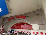 Steel WOW SUBS Sign & Plastic Menu Board.