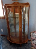 Triple Curved Glass Curio Cabinet with Glass Shelves & Mirror Back.