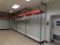 52' of Inventory Racking with Peg Board Backing with Metal Top Shelf, Botto