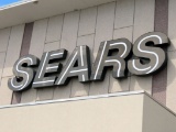 (3) SEARS Signs on the Building.