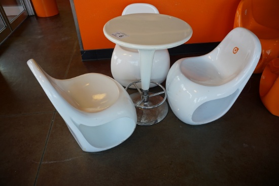 Plastic Round Table with (2) Plastic Chairs.
