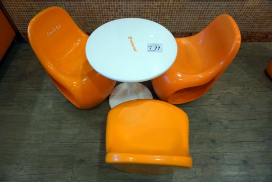 Round Plastic Table & (3) Orange Chairs.