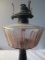 Antique metal base stem pink glass font oil kerosene lamp