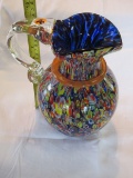 Vibrant colored glass pitcher