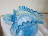 Blue crimped edge pitcher