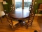 Antique Round Oak Dining Table w/ (4) Rush Seat Chairs