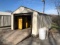 Steel Outbuilding w/ Overhead Door