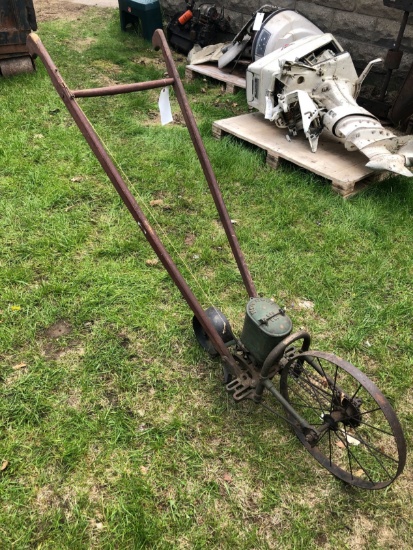 Antique Iron Age Push Seeder