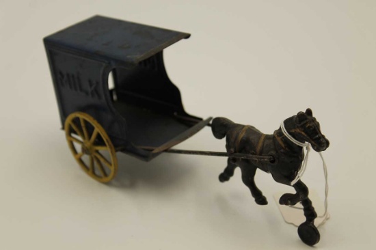 Vintage Painted Tin Toy Milk Wagon with cast iron wheels and cast iron horse