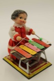 Tin Clock Works Toy Girl playing Xylophone