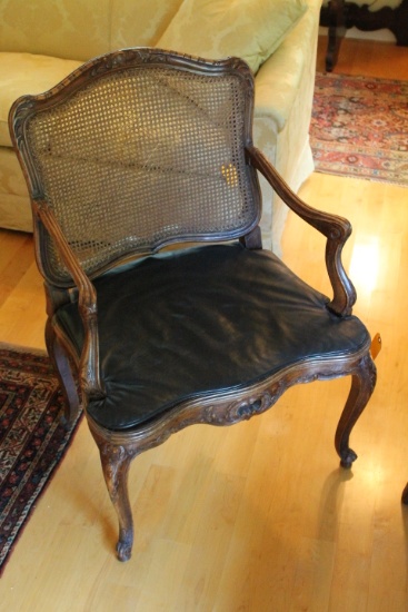 Carved Continental Arm Chair with Woven Wicker Seat and Back with Leather Cushion