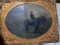 Civil War Tintype Photograph of a mounted soldier with sword drawn