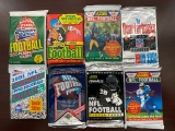 (8) Unopened Football Card Packs from late 80â€™s/90â€™s