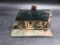 Cast Iron Cottage Doorstop in old Paint