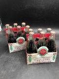 (2) Vintage 10 Ounce Six Packs of Coca Cola Holiday Hospitality Bottles